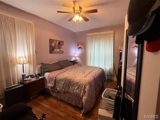 3225 N Taylor Ave, Saint Louis, MO 63115 - bedroom with wood finished floors and ceiling fan