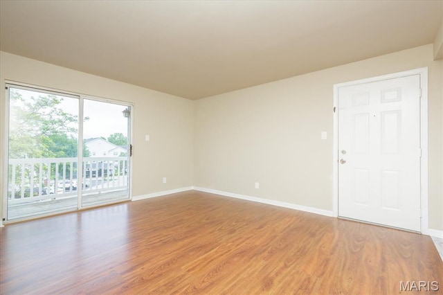 149 Jubilee Hill Dr Unit H, Grover, MO 63040 - empty room featuring light wood-type flooring and baseboards