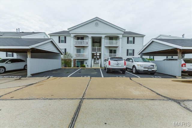 149 Jubilee Hill Dr Unit H, Grover, MO 63040 - view of property featuring covered and uncovered parking