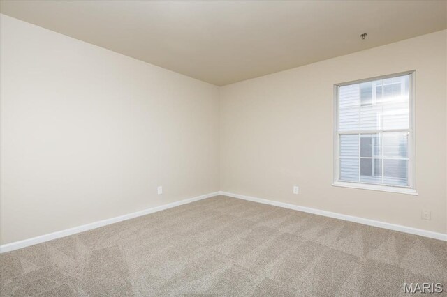 149 Jubilee Hill Dr Unit H, Grover, MO 63040 - unfurnished room with light carpet and baseboards