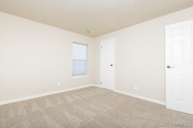 149 Jubilee Hill Dr Unit H, Grover, MO 63040 - empty room with light colored carpet and baseboards