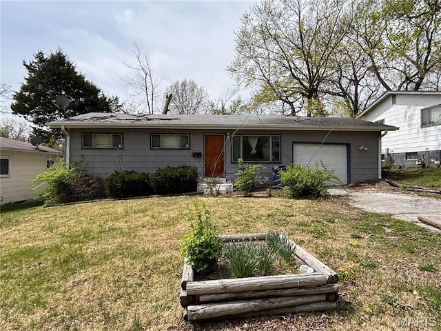 4005 Shirley Dr, Saint Louis, MO 63121 - single story home with a garage, driveway, and a front yard