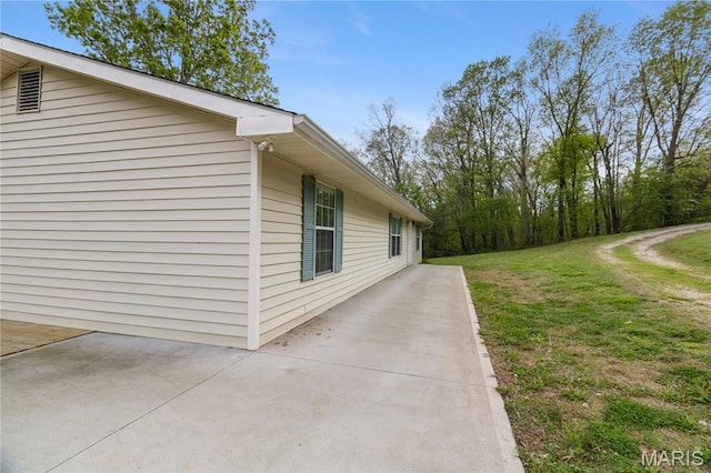14276 State Route 21, De Soto, MO 63020 - view of property exterior with a lawn and a patio area