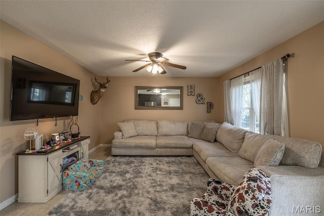2250 Pinta Dr, Warrenton, MO 63383 - living area featuring ceiling fan, baseboards, and a textured ceiling