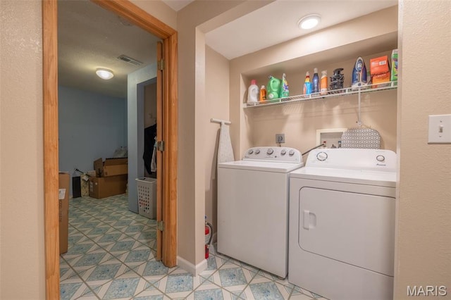 2250 Pinta Dr, Warrenton, MO 63383 - washroom featuring washing machine and clothes dryer