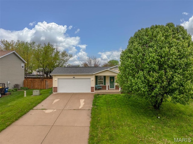2250 Pinta Dr, Warrenton, MO 63383 - view of front of house with brick siding, driveway, an attached garage, central AC unit, and covered porch