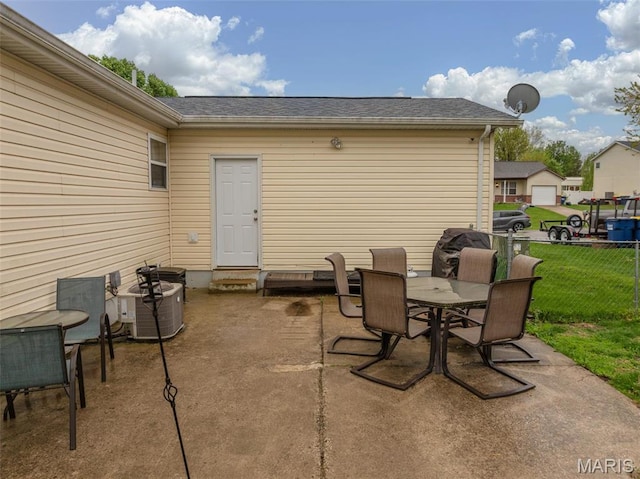 2250 Pinta Dr, Warrenton, MO 63383 - view of patio featuring outdoor dining area and cooling unit