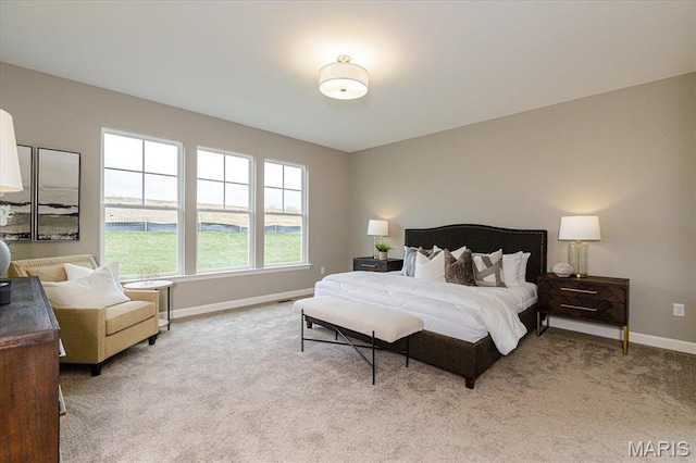 303 Clewer Park Ct, Lake St Louis, MO 63367 - bedroom with light colored carpet and baseboards