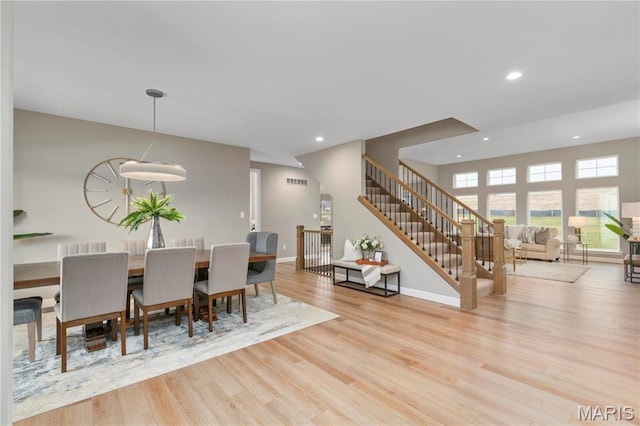 303 Clewer Park Ct, Lake St Louis, MO 63367 - dining space featuring wood finished floors, stairs, recessed lighting, and baseboards