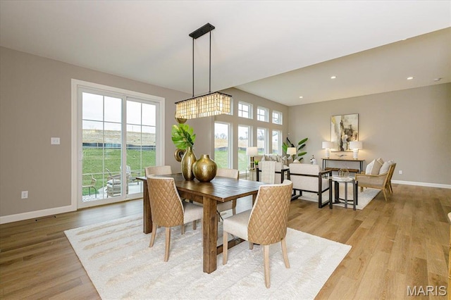 303 Clewer Park Ct, Lake St Louis, MO 63367 - dining area featuring baseboards, light wood-style flooring, and recessed lighting