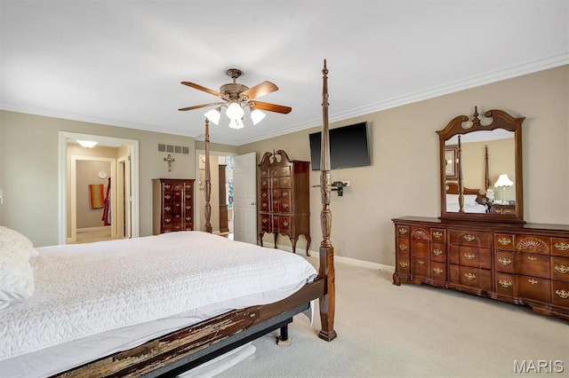 bedroom with light colored carpet, crown molding, a ceiling fan, and baseboards