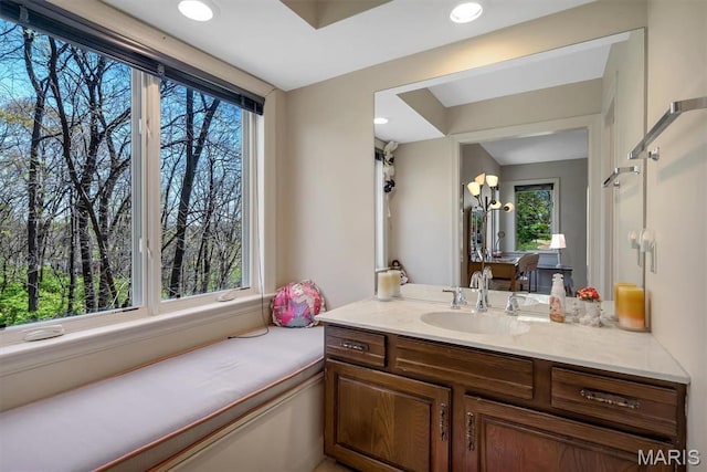 bathroom with recessed lighting and vanity