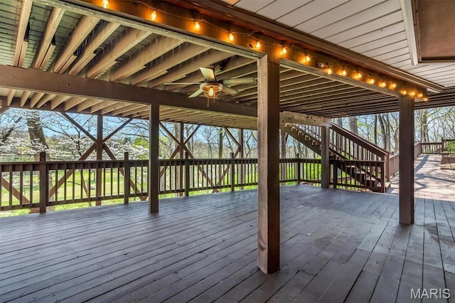 wooden deck featuring stairs