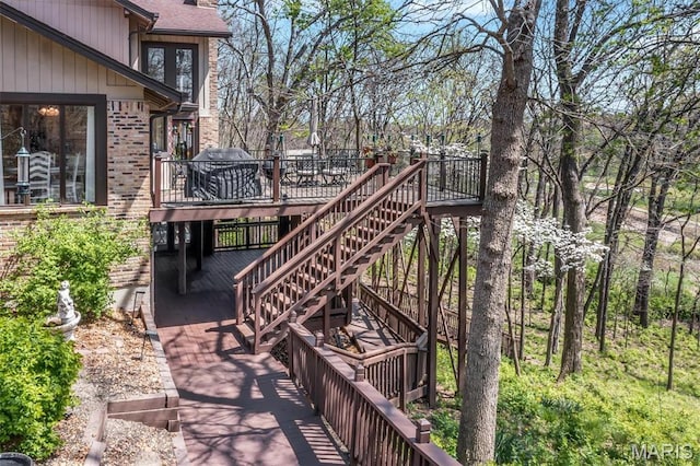 exterior space featuring a deck and stairway