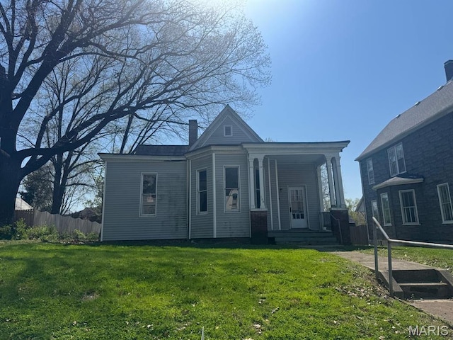 129 N Pennsylvania Ave, Belleville, IL 62220 - view of front of home with a chimney