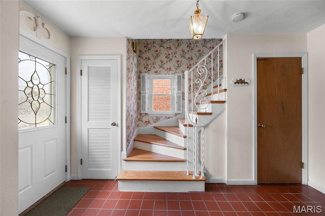 6623 Neosho St, Saint Louis, MO 63109 - foyer entrance featuring stairway, tile patterned floors, baseboards, and wallpapered walls