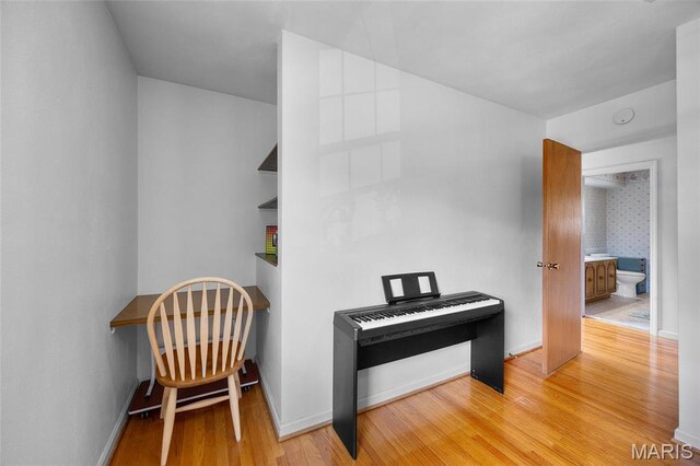 6623 Neosho St, Saint Louis, MO 63109 - hall with wood finished floors and baseboards