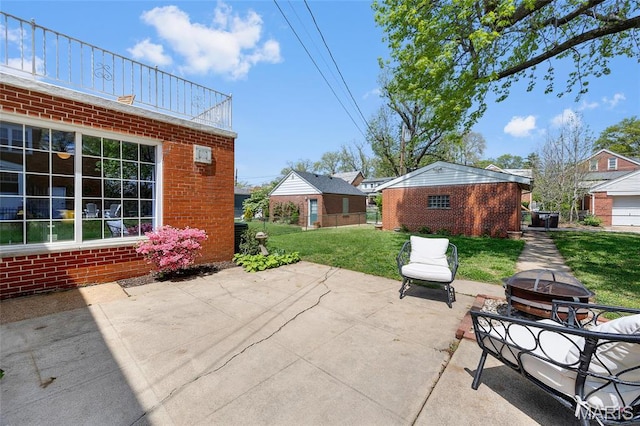 6623 Neosho St, Saint Louis, MO 63109 - view of patio / terrace with a fire pit