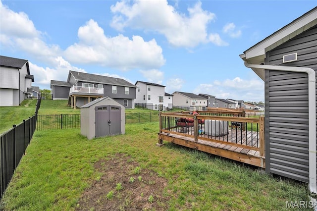 1103 Baseball Dr, Foristell, MO 63348 - view of yard featuring a residential view, a storage unit, a wooden deck, and an outbuilding