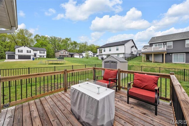 1103 Baseball Dr, Foristell, MO 63348 - wooden terrace featuring a residential view, a shed, and an outdoor structure