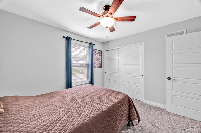 1103 Baseball Dr, Foristell, MO 63348 - carpeted bedroom with a closet, baseboards, and ceiling fan