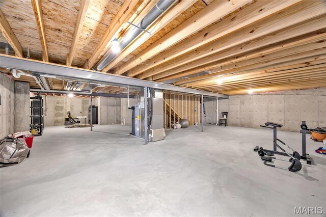 1103 Baseball Dr, Foristell, MO 63348 - unfinished basement featuring heating unit and stairway