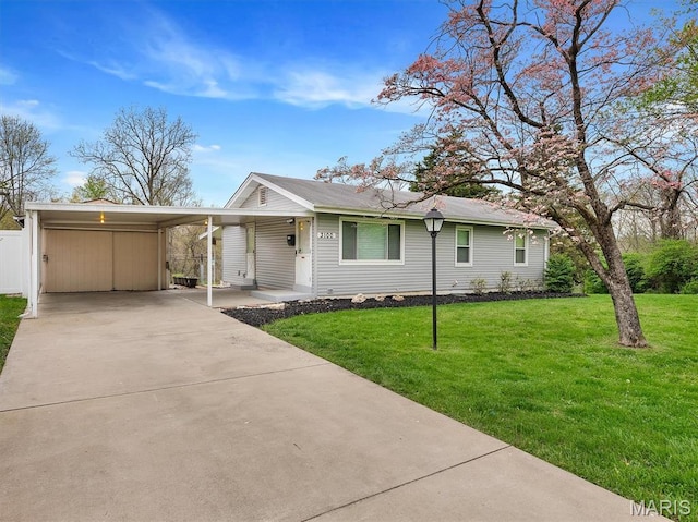 3100 Edgemont Ct, Saint Ann, MO 63074 - ranch-style house featuring driveway and an attached carport