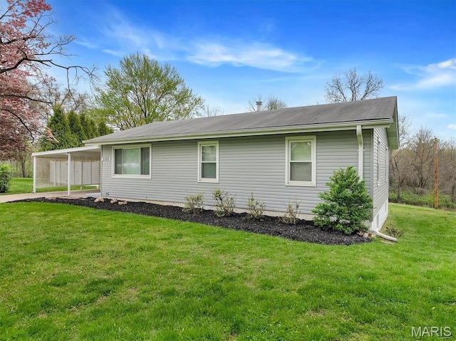 3100 Edgemont Ct, Saint Ann, MO 63074 - view of side of property with a yard and a carport