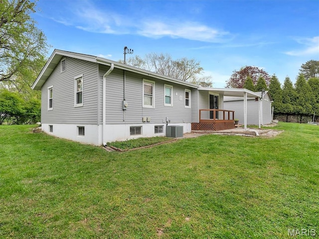 3100 Edgemont Ct, Saint Ann, MO 63074 - rear view of house featuring a yard, central AC unit, and a wooden deck