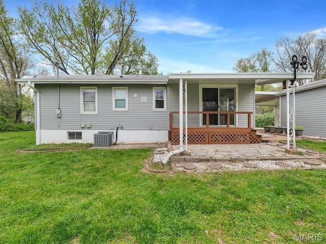 3100 Edgemont Ct, Saint Ann, MO 63074 - rear view of property featuring a yard, a patio, and central AC