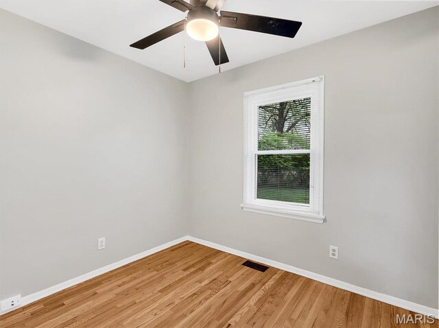 3100 Edgemont Ct, Saint Ann, MO 63074 - unfurnished room featuring baseboards, light wood-style floors, and ceiling fan