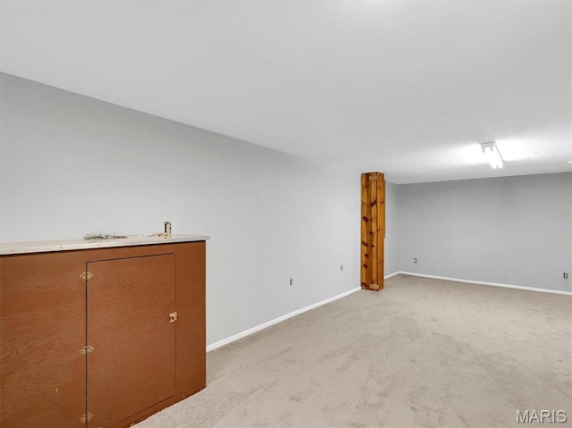 3100 Edgemont Ct, Saint Ann, MO 63074 - finished below grade area with light carpet and baseboards