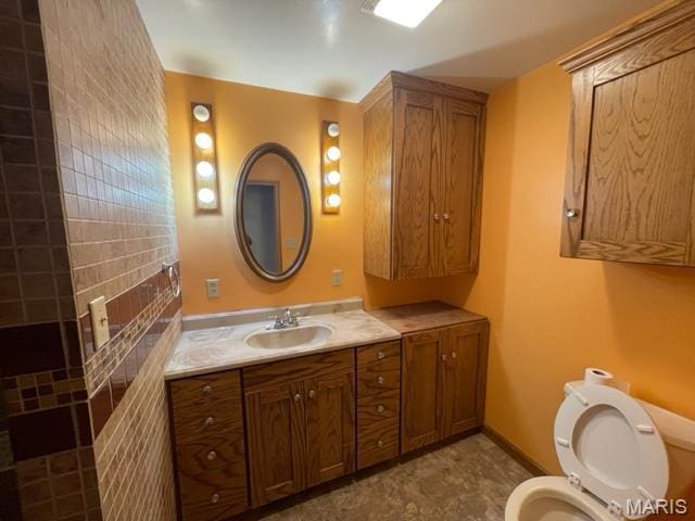 515 S Main St, Fredericktown, MO 63645 - bathroom featuring toilet and vanity