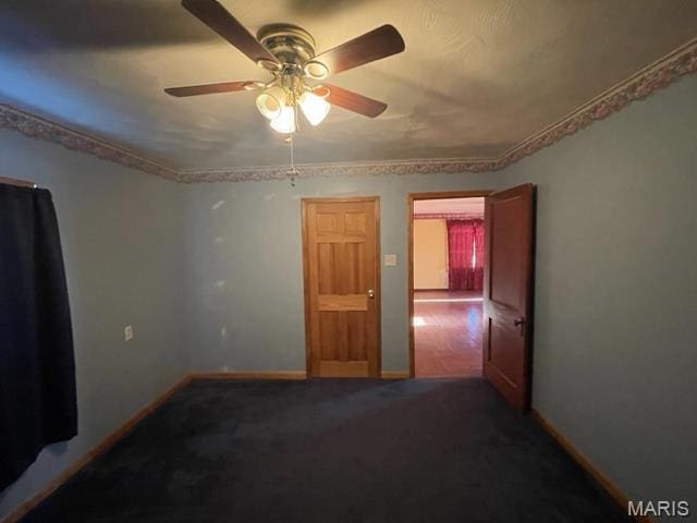 515 S Main St, Fredericktown, MO 63645 - carpeted empty room with a ceiling fan and baseboards
