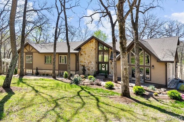 16480 Walnut Rail Rd, Chesterfield, MO 63005 - rear view of property featuring stone siding and a yard