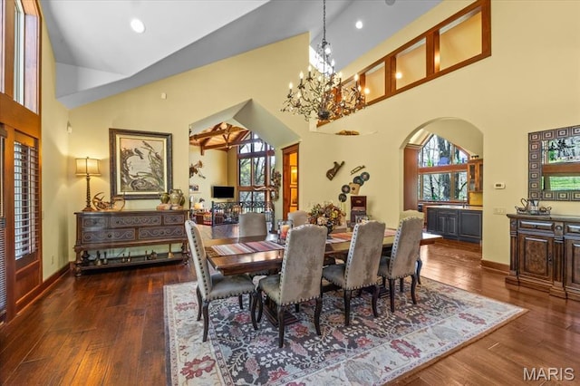 16480 Walnut Rail Rd, Chesterfield, MO 63005 - dining space featuring arched walkways, hardwood / wood-style flooring, high vaulted ceiling, recessed lighting, and a chandelier