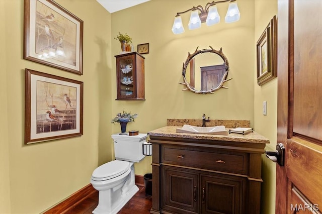 16480 Walnut Rail Rd, Chesterfield, MO 63005 - bathroom featuring toilet, wood finished floors, and vanity