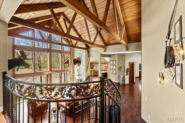 16480 Walnut Rail Rd, Chesterfield, MO 63005 - dining space featuring wooden ceiling, wood-type flooring, beamed ceiling, baseboards, and high vaulted ceiling