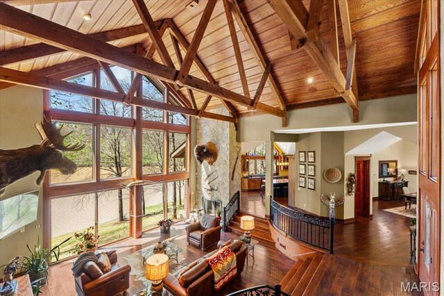 16480 Walnut Rail Rd, Chesterfield, MO 63005 - living area with wooden ceiling, healthy amount of natural light, wood-type flooring, beam ceiling, and high vaulted ceiling