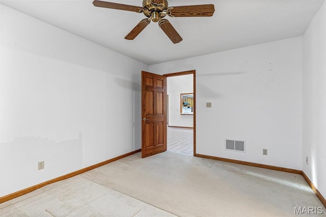 3581 Jarvis Rd, Hillsboro, MO 63050 - spare room with light colored carpet, baseboards, and a ceiling fan