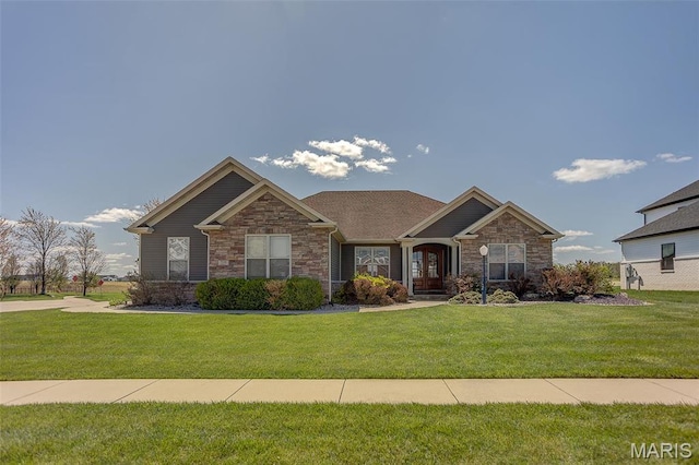 7048 Alston Ct, Edwardsville, IL 62025 - craftsman-style house with stone siding and a front lawn