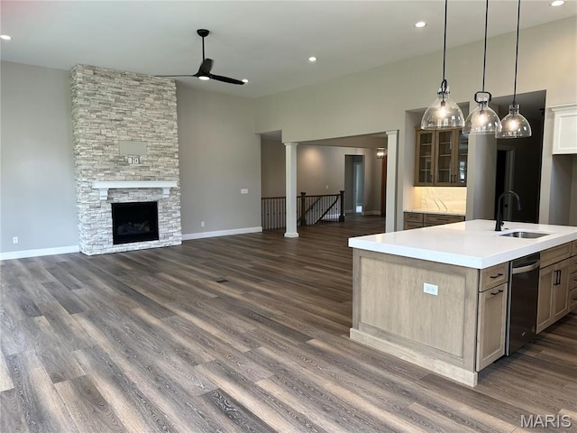11906 Santino Ct, Creve Coeur, MO 63141 - kitchen featuring a sink, ceiling fan, light countertops, dark wood-style flooring, and recessed lighting