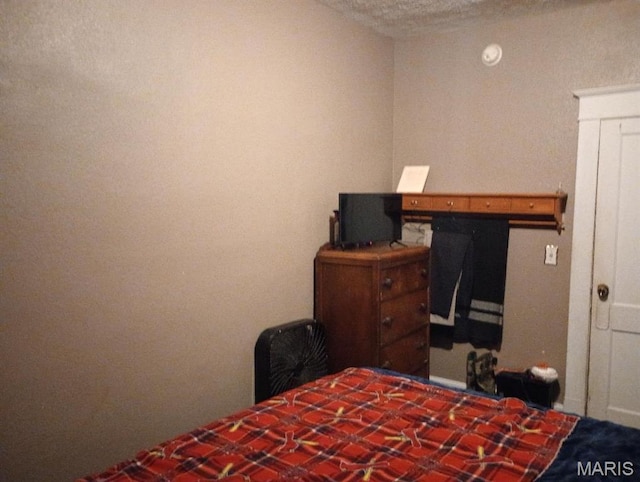 306 Kingshighway, East Alton, IL 62024 - bedroom with a textured ceiling