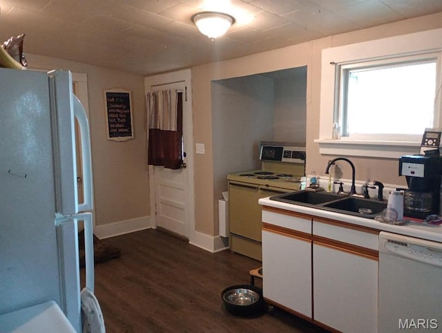 306 Kingshighway, East Alton, IL 62024 - kitchen with white appliances, a sink, dark wood-style floors, white cabinets, and light countertops