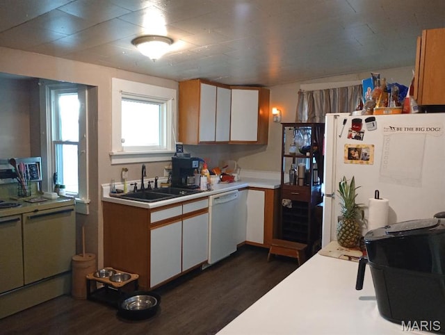 306 Kingshighway, East Alton, IL 62024 - kitchen with white appliances, a sink, light countertops, dark wood finished floors, and white cabinetry