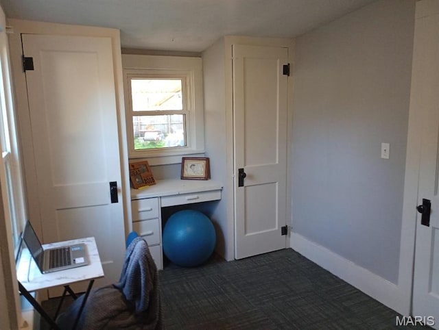 306 Kingshighway, East Alton, IL 62024 - unfurnished office featuring dark colored carpet and baseboards