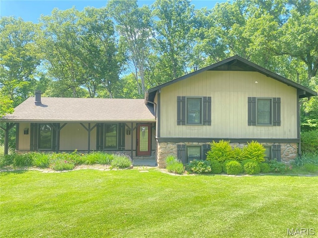 3019 Cedar Ridge Ln, Waterloo, IL 62298 - split level home with a front yard, stone siding, and covered porch
