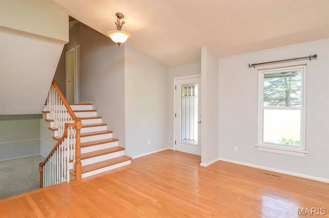 3019 Cedar Ridge Ln, Waterloo, IL 62298 - entrance foyer featuring wood finished floors, baseboards, stairway, and vaulted ceiling