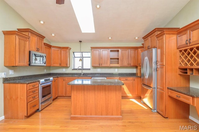 3019 Cedar Ridge Ln, Waterloo, IL 62298 - kitchen featuring appliances with stainless steel finishes, a sink, open shelves, light wood-style flooring, and recessed lighting