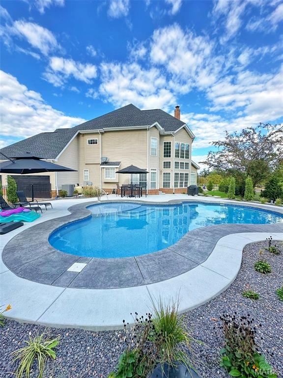 500 Overlook Terrace Court, Eureka, MO 63025 - swimming pool featuring a patio